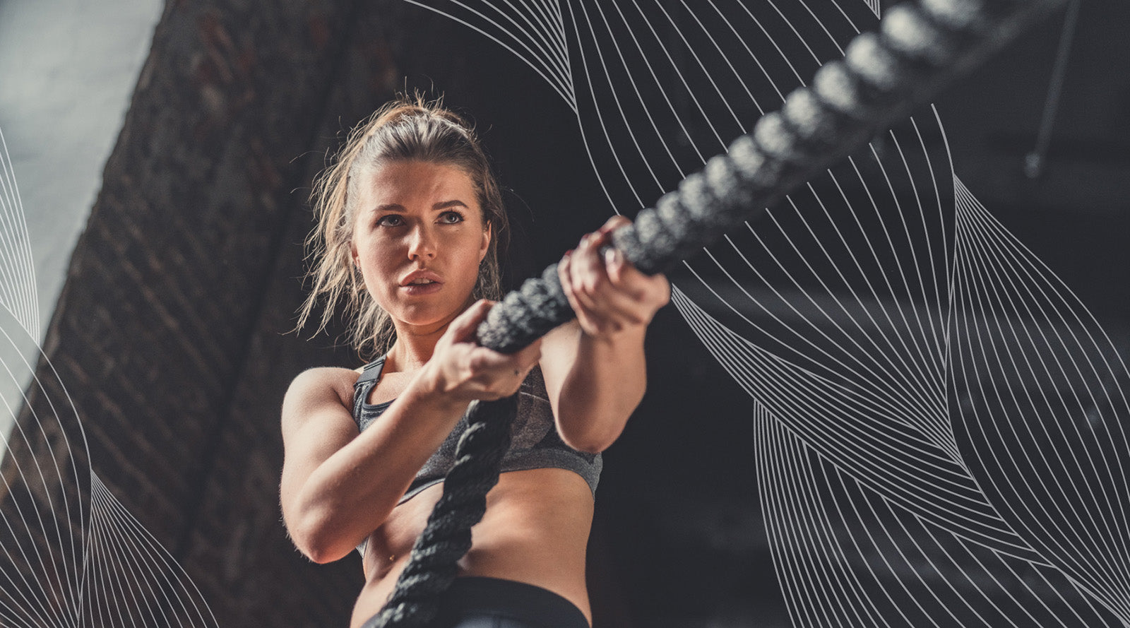 Woman pulling Battle Rope with Do Vitamins Muscle Fiber overlay